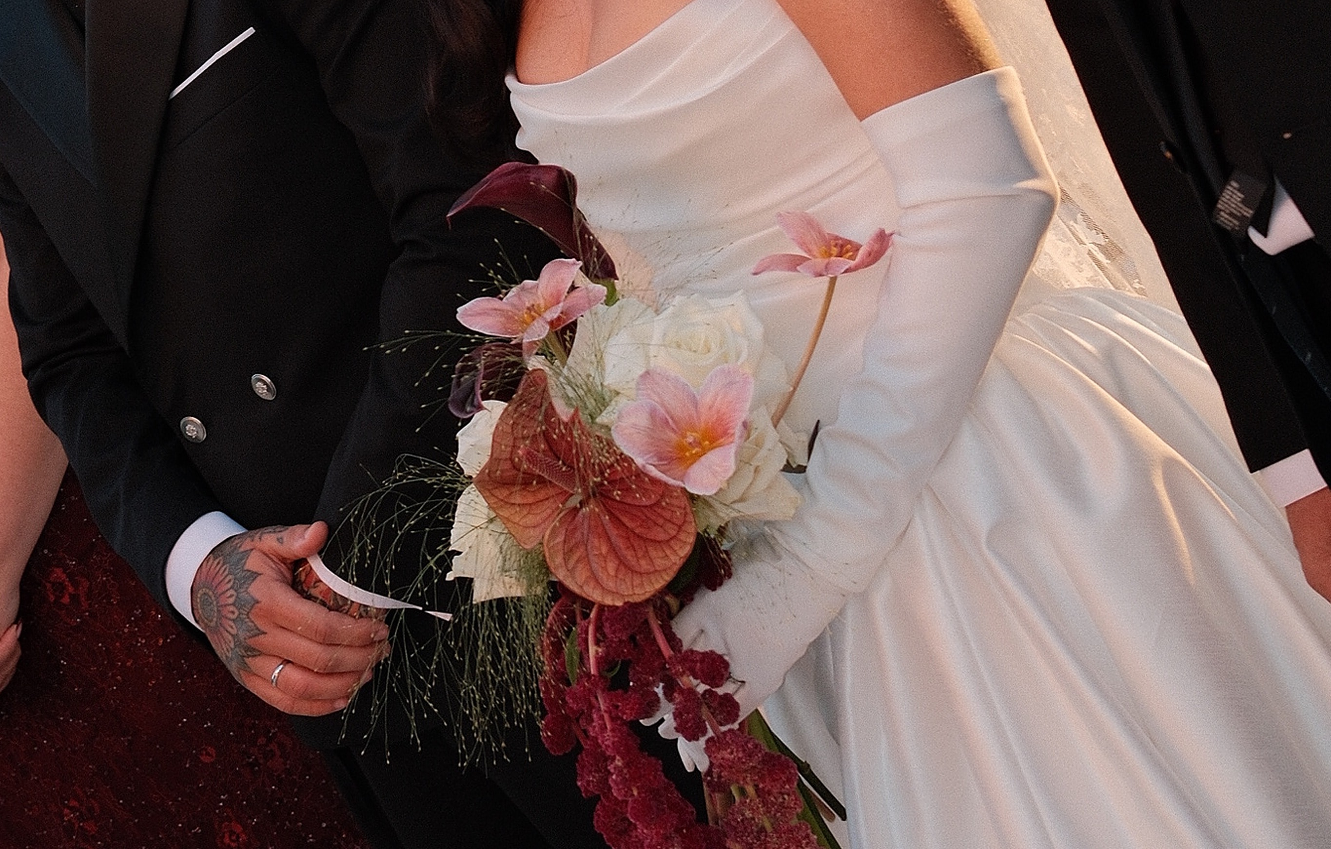 Bouquet and wedding attire detail